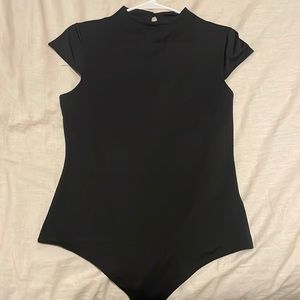 Sleek style black funnel neck bodysuit